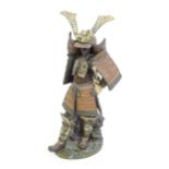 A large Lladro model of a Japanese Samurai, designed by Antonio Ramos, decorated by C. Bauset. Model