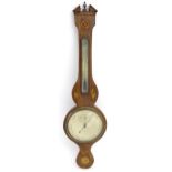 A 19thC mahogany and satinwood inlaid wheel barometer. The dial signed Torre & Co London. Approx.
