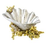 A French gilt bronze naturalistic sculpture centrepiece of seashell on bed of coral form with rock