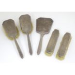 Silver dressing table items to include brushes and hand mirror with engine turned decoration,