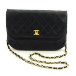 Vintage fashion: A Chanel dark navy quilted leather half moon double flap bag. Approx. 9 1/4" wide