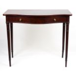 A late 19thC Edwards & Roberts serpentine fronted console table with two short drawers with fluted