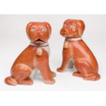 Chinese Export. A pair of Chinese export porcelain models of spaniel pups