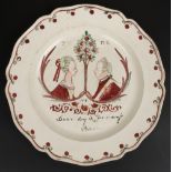 Creamware. A Dutch decorated creamware plate, late 18th century