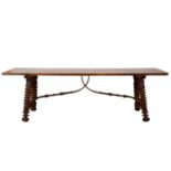 A SPANISH FRUITWOOD REFECTORY TABLE