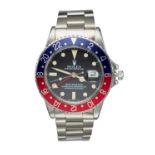ROLEX OYSTER PERPETUAL GMT-MASTER: A STAINLESS STEEL BRACELET WATCH