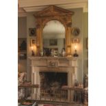 AN ARCHITECTURAL GILTWOOD OVERMANTEL MIRROR