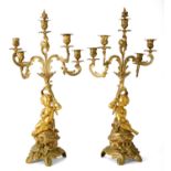 A PAIR OF GILT METAL FIVE-BRANCH CANDELABRA