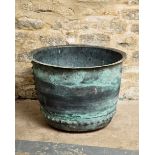 A LARGE RIVETED COPPER WASHING BOILER WITH VERDIGRIS PATINATION