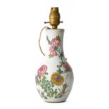 A CHINESE PORCELAIN FAMILLE ROSE BOTTLE VASE