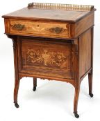 A late Victorian rosewood desk with inlaid decoration, the gilt metal gallery back above a drawer,