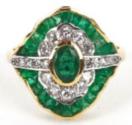 An Art Deco style 18ct gold emerald and diamond dress ring, total diamond weight approximately 0.