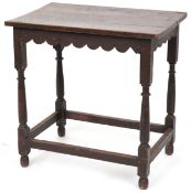 A Victorian oak rectangular side table raised on turned and block legs united by stretchers, 62cm
