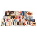 A collection of vinyl LP records and 45rpm records including Elvis Presley, Buddy Holly & The