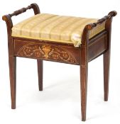 A late Victorian mahogany piano stool, the overstuffed hinged seat above an inlaid panel, raised