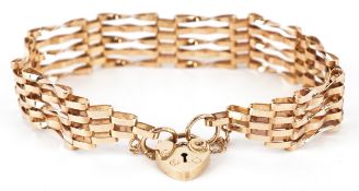 A 9ct gold five row gate bracelet with love heart shaped padlock clasp, 16cm in length, 7.3g.