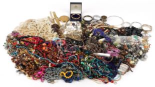 An extensive collection of vintage jewellery including beaded necklaces, bracelets and earrings.