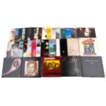 A collection of vinyl LP records including ELO Out of the Blue, Queen A Day at the Races, ABBA Super