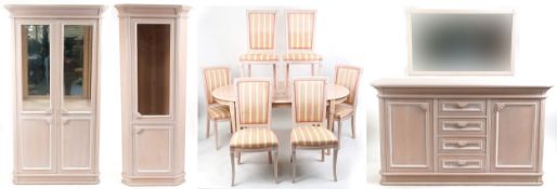 A modern suite of pink painted dining room furniture comprising a side cabinet, corner cabinet,