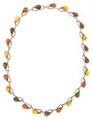 A Modernist silver natural amber panel bracelet, 43cm in length, 28.4g.