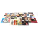 A collection of vinyl LP records including The Jimi Hendrix Experience, The Beatles, The Doors, King