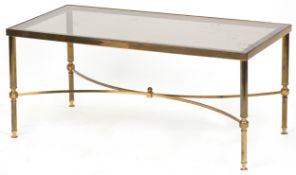 A late 20th century gilt metal rectangular coffee table, the glass top raised on reeded legs