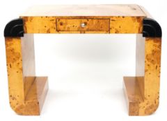 An Art Deco style walnut veneered console table, of 'U' form, H-82cm W-120cm D-64cm.