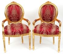 A pair of modern George III style gilt painted salon armchairs, the upholstered seats and backs