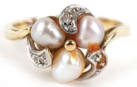 A 9ct gold diamond and cultured pearl cluster ring, total diamond weight approximately 0.03 carat,