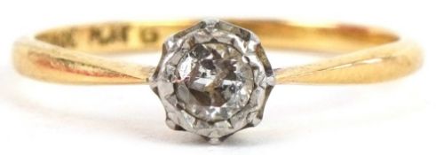 An 18ct gold and platinum diamond solitaire ring, the diamond approximately 3.10mm in diameter, size