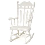 A 20th century white painted rocking chair on turned supports, 116cm H x 65cm W x 77cm D.