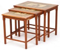 A mid 20th century nest of three teak occasional tables with tile inset tops, 47cm H x 58cm W x 47cm