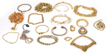 A collection of vintage and later gold plated and gilt metal costume necklaces and bracelets,