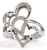 A 9K white gold diamond double love heart ring, size L, 3.3g.