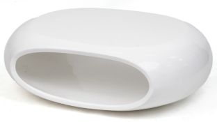 A late 20th century white fibreglass coffee table with an open central section, 31cm H x 101cm W x