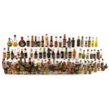 A large collection of vintage alcohol miniatures including Martell Cognac, apricot wine, Bols
