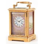 A miniature French brass cased carriage clock having Sèvres type panels, 7.5cm high.