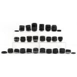 Vintage camera lenses including Super Paragon 135mm, Hanimex, Miranda 28mm, Olympus 50mm, Sigma 35-