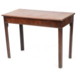 An early 19th century mahogany side table raised on block legs, (formerly a tea table), 66cm H x