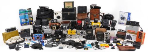 A large collection of vintage and later cameras and accessories including Sony Cyber Shot DSC