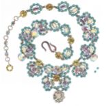 Christian Dior, a white metal rhinestone cocktail necklace set with turquoise coloured cabochons,