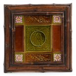 19th century Wedgwood pottery tile relief moulded with a gentleman, within a bamboo design frame,