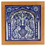 20th century pottery tile hand painted with an urn and Arabesques, framed, overall 23cm x 23cm.