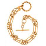 Vintage gilt metal watch chain with T bar and dog clip clasps, 28cm in length, 30.5g.