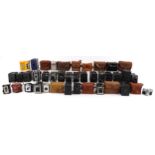 Large collection of vintage box cameras, predominantly Kodak, including Brownie Junior, Popular