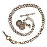 Victorian silver graduated watch chain with T bar, dog clip clasp, coins and watch key, 39cm in