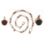 Victorian yellow metal watch chain with dog clip clasp together with two spinner fobs, one set