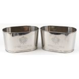 Pair of polished metal Champagne ice buckets with Napoleon Bonaparte and Lily Bollinger mottos, 24.