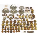 Collection of military interest shoulder titles, uniform buttons and Scottish cap badges of