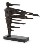 Patinated bronze sculpture of an abstract figure in the wind, raised on a marble base, 40cm high.